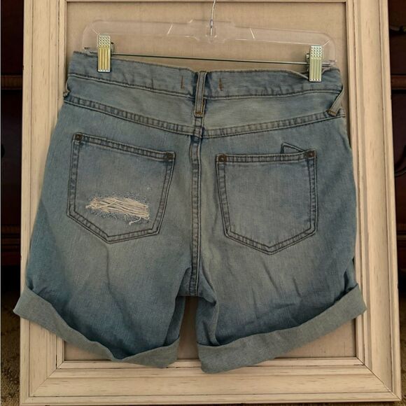 Free People distressed medium wash denim button fly cuffed shorts. 25 - Picture 2 of 12